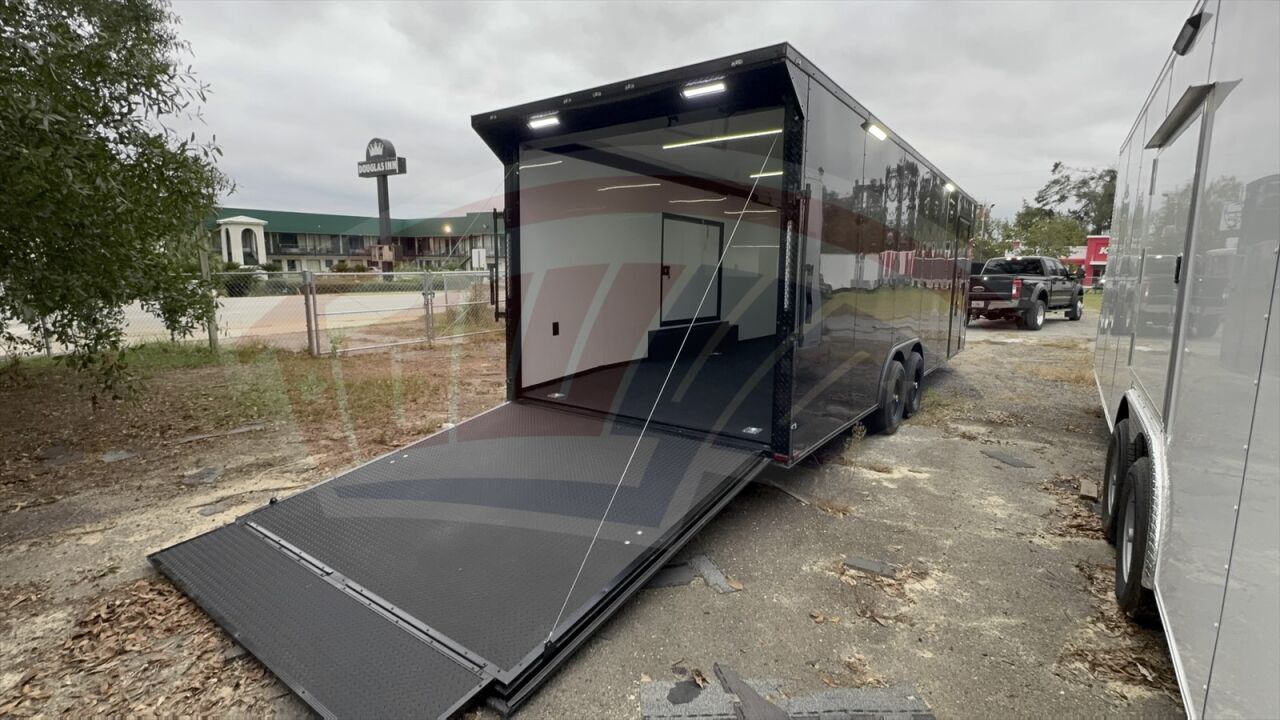 2026 Hook & Line 8.5x24 Cargo enclosed cargo trailer in black, photo 2