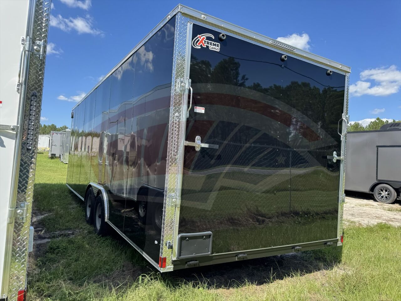 2026 Xtreme Cargo 8.5x24 Cargo enclosed cargo trailer in black, photo 3