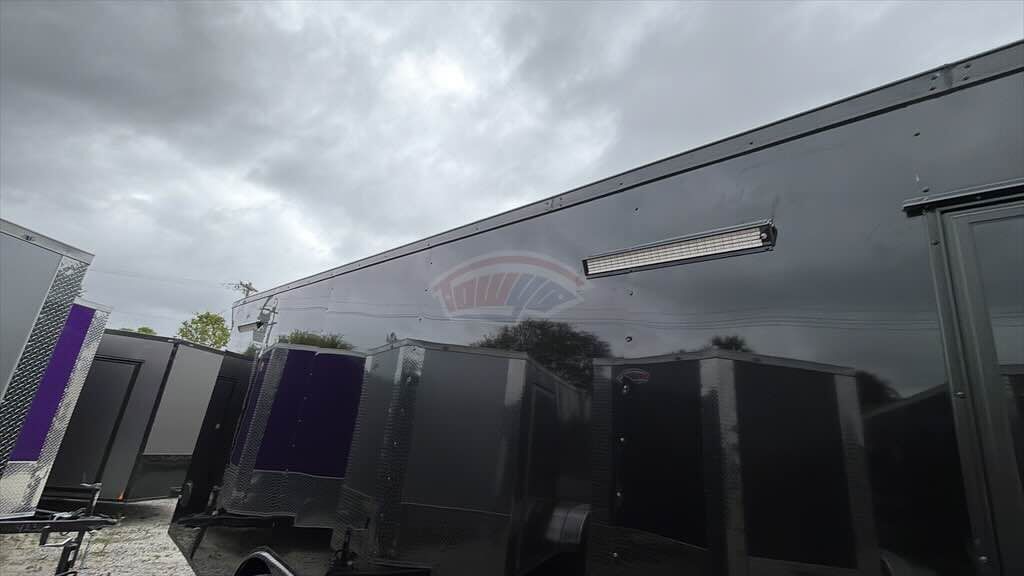 2026 Maximum 8.5x24 Enclosed Cargo trailer in black, photo 3
