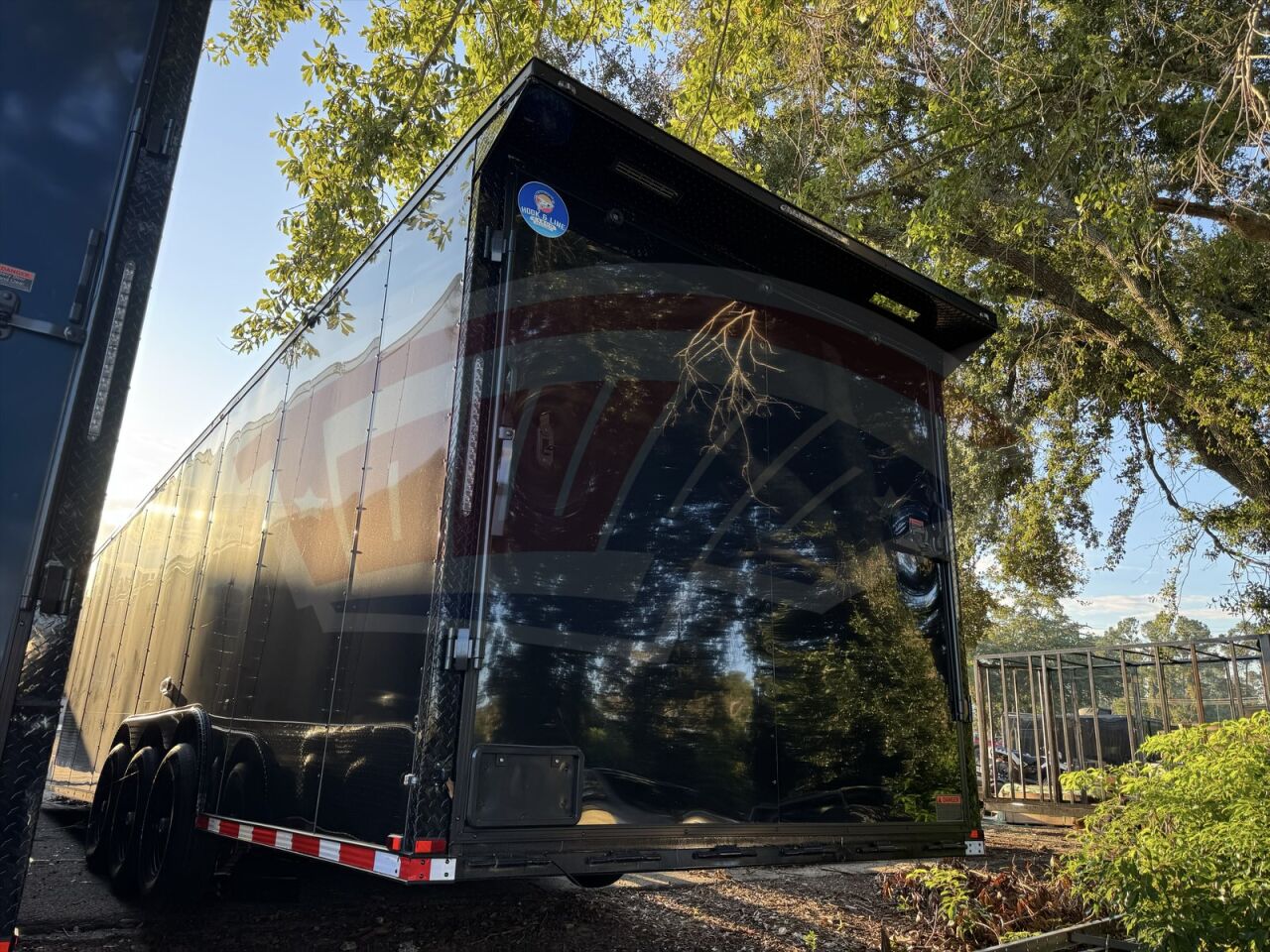 2025 Hook & Line 8.5x38 Enclosed Cargo trailer in black, photo 2